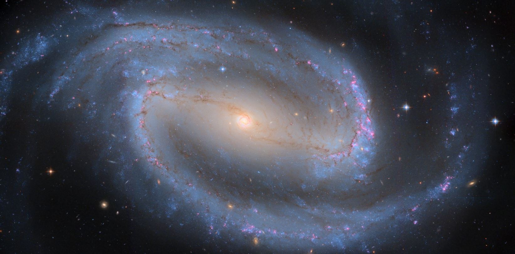 The glories of the Universe revealed . A stunning spiral Galaxy NGC1300 ...